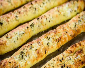 Parmigiano and Herb Breadsticks - everybodylovesitalian.com
